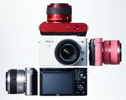 расцветки цифровых фотоаппаратов Nikon 1 V1 и J1, сменной оптики
